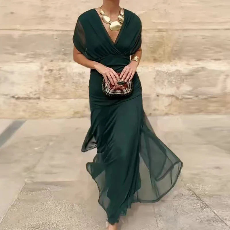 Vestido largo floral para invitadas de boda con escote bardot y cintura fruncida