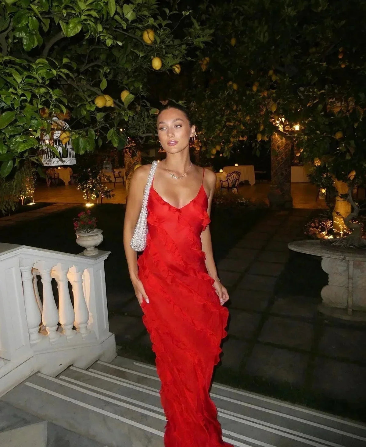 Abito lungo a sirena elegante da donna con volant
